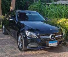 Seamless Airport Transfer: Mercedes C180 Limousine in Egypt.