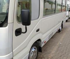 Rental Toyota Coaster for Airport - Reliable Limo Rides.