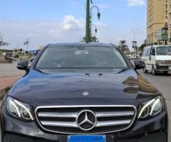 إيجار مرسيدس E200 بالسائق... استمتع بتجربة القيادة الفاخرة دون عناء.