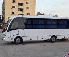 إيجار أتوبيس ميتسوبيشي 28 راكباً لرحلات السفر الطويلة