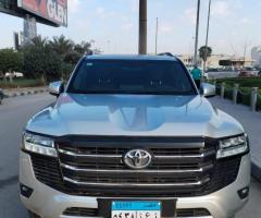 Book Your Toyota Land Cruiser 2025 Rental with Chauffeur to/from Cairo Airport