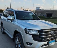 Book Your Toyota Land Cruiser 2025 Rental with Chauffeur to/from Cairo Airport