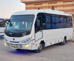 إيجار أتوبيس ميتسوبيشي 28 راكباً للرحلات والتنقلات