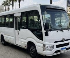 إحجز الان تويوتا كوستر 2024 بسائق مع شركه تورست فخامة الرحلة تبدأ من هنا