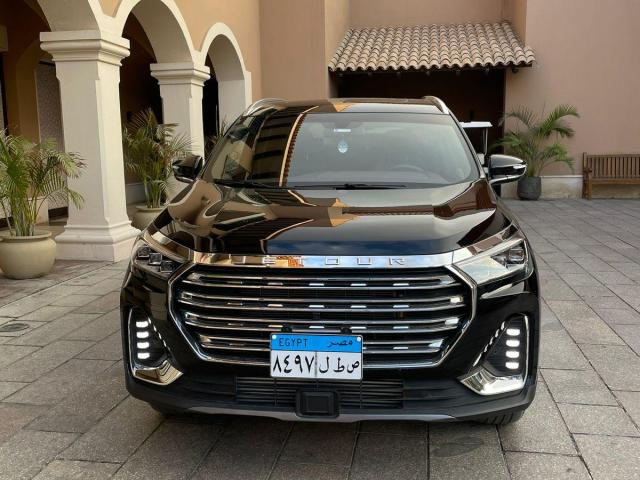 Jetour X90 Plus: Luxury 7-Seater Rental with Professional Driver.