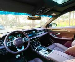 Jetour X90 Plus: Luxury 7-Seater Rental with Professional Driver.